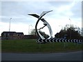 Roundabout with sculpture on the A577 in M46 0TZ