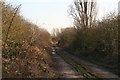 Track by the Whisby Gravel Pit works entrance in LN6 9BY