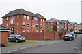 Flats along Britannia Drive in RG22 4QE