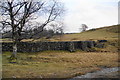 Small reservoir dam near Wise Een Tarn in Claife