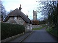 Cottage and church, West Overton in SN8 4ES