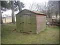 A gardener's shed by Village Hall at Muir of Fowlis in AB33 8JA