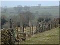 Fence and stile with valley view in DE55 6DB