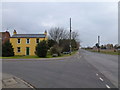 Yellow house on the cross roads, Moulton Seas End in Moulton Seas End