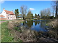 Large farmhouse and pond, Great Massingham in PE32 2HA