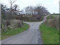 Road junction west of Whistle Bare in TD15 2TG