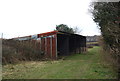 Farm building by the footpath in TN33 9QH