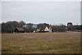 Farmhouse across a field in TN33 9QN