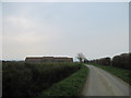 Approaching farm buildings on Ings Road in YO13 9BS