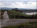 Junction of moorland tracks by old reservoir in OL12 0TT