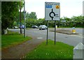 Roundabout on Denham Road with footpath on left in SL0 0NJ