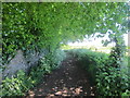 Footpath beside church heading down to Monks Pool in BS36 1SF