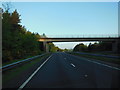A farm track bridge goes over the A30 in EX4 2HF