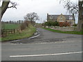 Minor road junction & cottage off B6461 in TD12 4HH