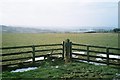 Fence and stile near Sarsgrove Farm in OX7 6NZ
