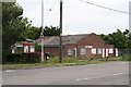 Industrial building and notice board in Walcott Road in LN4 4EH