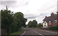 Houses opposite Cottage Farm on A51 at Burston in ST18 0GZ