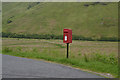 Post box at road junction in IV40 8LA