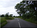 Redisham Road & field entrance in NR34 8LZ