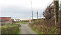 Junction of a minor lane with the A499 at Aberdesach in LL54 5EL