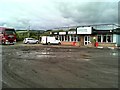 Muddy carpark of the roadside cafe in PH14 9SE