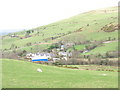 The hamlet of Tai'n lon from the Capel Uchaf road in LL54 5DG
