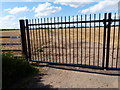 Gates across the track to Barn Farm in CV9 1RE