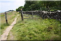 Gateway across Skipton Moor Lane by small wood in BD23 6DR