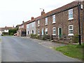 Terraced houses at East Cowton in DL7 0DT