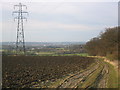 Ploughed field and pylon, with view over to the Lea Valley in EN9 2SF