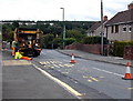 Repainting bus stop road markings in Badminton Grove, Ebbw Vale in NP23 5PX