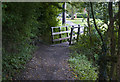 A footbridge out of the wood and into the park in PR4 4BG