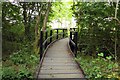 Footbridge out of Bushy Leaze Copse in OX2 9NX
