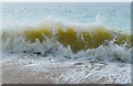 Breaking waves on Chesil Beach near East Bexington, Dorset in DT3 4LB