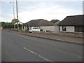 Cottages at the side of the A743 in ML11 7SD