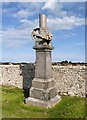 A memorial at Kinneddar Cemetery, Lossiemouth in IV31 6TG