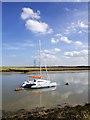 Pylons marching across Nagden Marsh from the Seawall on Faversham Creek in ME13 9DR