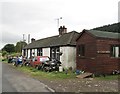 A cottage with motorbikes at Burnfoot in DG1 1RL