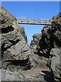 Newquay: Bridge to Porth Island at low tide in TR7 3AE