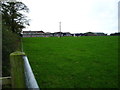 Grazing field beside Langford Farm buildings in CW9 7TD