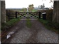 Gated farm entrance to Henry's Hill in CA6 6EA