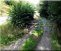 Gated track to the edge of Halfway House near Knighton in LD7 1SA