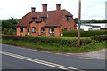 Large chimneys on Pen Elm Hill semis near Taunton in TA2 6PH