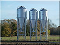 Three shiny silos in the Norfolk sunshine in PE32 1HL