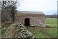Stone barn by footpath in CA11 9NQ