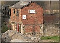 Crumbling old building on the Grand Union Canal in Leicester. in LE3 9RT