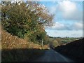 Looking east down Smallacombe Hill in EX16 9JR