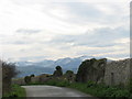The Penmon road with the Glyderau in the background in LL58 8RW