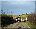 Gated track to Rainshaw Farm in YO26 8EG