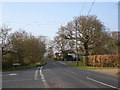 Stone Cross junction with Frith Road and Stone Cross Road and the Bilsington Road in TN25 7JJ